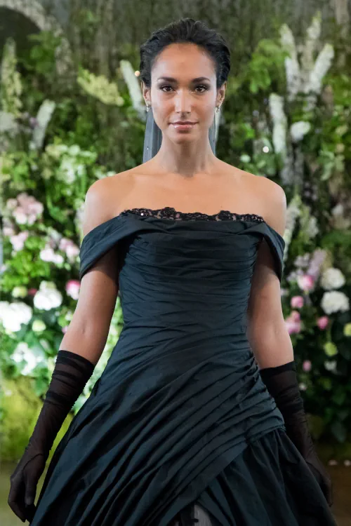 Renowned for glamorous, highly distinctive gowns, Stuart brought a sense of drama, romance and individuality to the bridal catwalk.